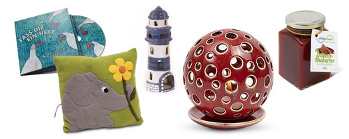 Produkte aus der Greifenwerkstatt Ein Kissen, ein Lampenschirm, ein Glas Marmelade und ein Leuchtturm aus Porzellan